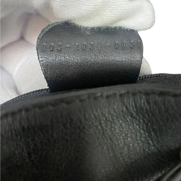 Gucci Black Leather Backpack with Gold Accents - Picture 11 of 13